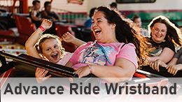 Carnival ride with mother and daughter, button for advance ride wristband