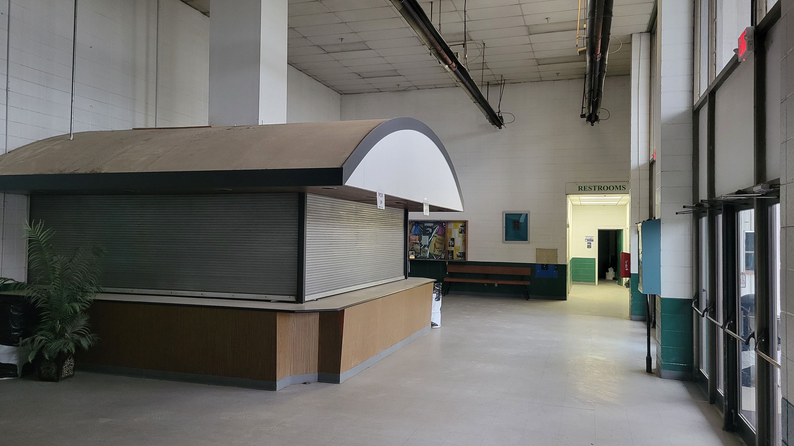Arena Foyer with food stand and restrooms in distance