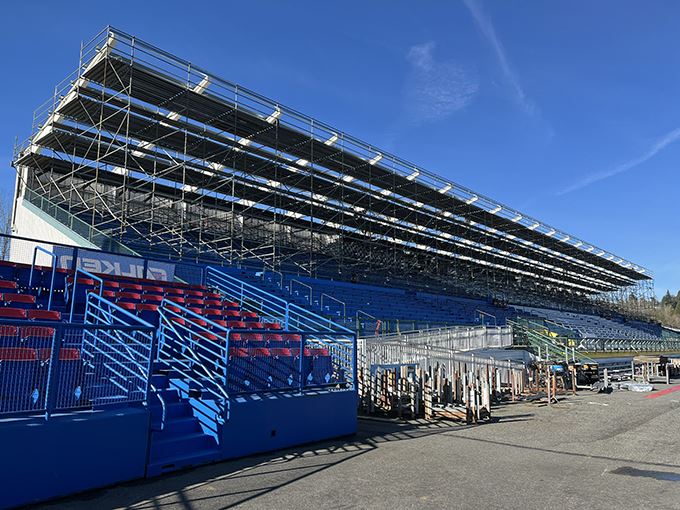 The evergreen state Fair park Grandstands with the roof removed and scaffolding on a sunny day. 